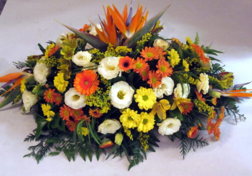centro funerario colores cálidos_flores lantana